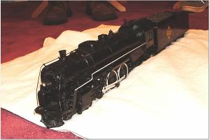 This is a Live Steam ‘O’ Gauge Pacific made by Neff Model Locomotive Works, Chagrin Falls, Ohio. From Classic Toy Trains
