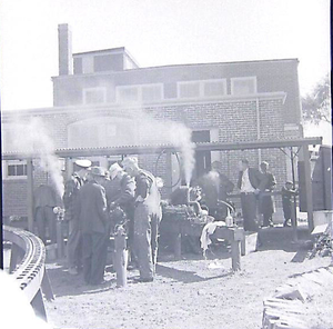 Arthur Wegner observing steam-up of Gene Stevens' 2-4-4T #7, at NELS Danvers, MA, October 1939.