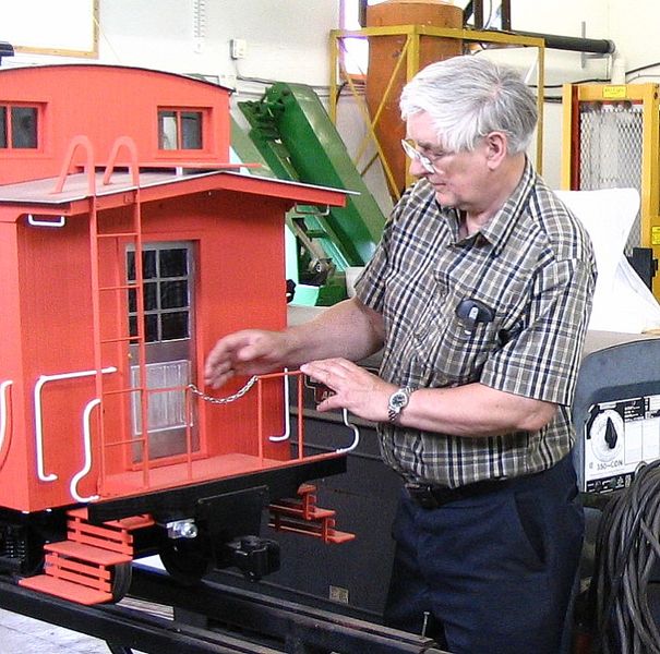 File:Bill Dykeman and his 2.5 inch scale caboose.JPG