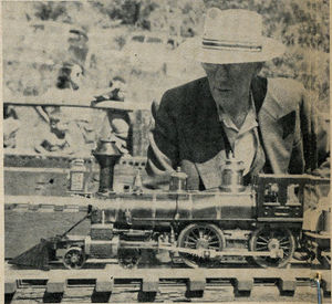 Walter Brown examines Bill Brower's old time loco. Photo by L.M. McKenney. GGLS Labor Day Meet 1953. From "The Miniature Locomotive", Nov-Dec 1953.