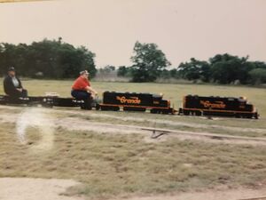 David Hannah III's Rio Grande motive power at the Austin & Texas Central Railroad in Manor, Texas. Date unknown, engineer and rider unknown. Kenney Rhodes Jr, used with permission.