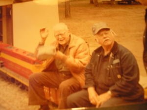 Here is photo of Austin Barr from Cary Nettles. Austin is on the right and Snub Pollard is on the left. Cary is the senior member of Mid-South Live Steamers at 97 years old! (as of 2013).