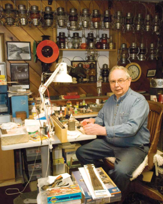 Dick Arnold, master machinist and restorer of Little Maryland, at home among his train memorabelia.
