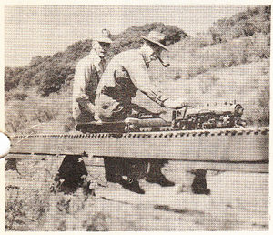 Vic Shattock and Scotty Gordon running Vic's 2-1/2 inch gauge Mikado on a section of the GGLS Redwood track in April 1950.