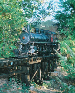 "End of a long day". This is a 44 year old 4-4-0 built by my Cliff Blackstaffe. It is on a private track on Vancouver Island. Photographer: Josh Blackstaffe, grandson of Cliff.