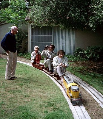 My girlfriend trying out the battery-operated diesel loco. Is Ollie worried, or what? Marie, Ollies wife is "playing caboose"...