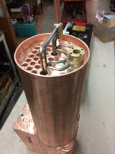A beautiful tig-welded copper boiler by Andrew Probyn shows installation of superheater in flues.