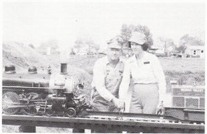 Alex and Grace Hitzfelder drive the Golden Spike on their Medina Valley Southern railroad in Devine, Texas, November 25, 1978