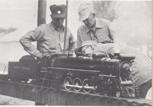 Gene Stevens (left) and W. Roberts discussing Roland Martin's 3/4 inch scale Maine Central 4-8-4.