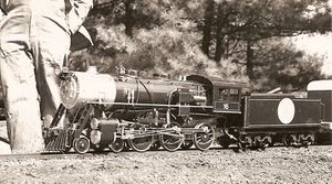 No. 16 - In 1975, Bill Van Brocklin brought his 4-6-0 ten wheeler to the meet at Carl Purinton's Boxford Outer Belt Railroad. Here it reposes on the 3-1/2 inch gauge track. This engine has Baker valve gear. Photo by Bob Hornsby.
