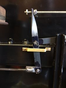 Support brackets made from flat brass stock were added to keep the levers in place. Nylon lock nuts were later used on both sides of the lever.