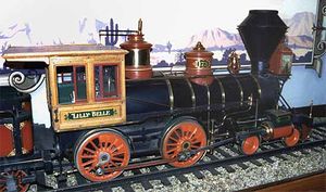 This is the "Lilly Belle", a live steam engine in 1:8 scale, 7 1/4" gauge, built by Walt and his friends in the workshops of the Disney Studio. It is now on display at the railroad station in Disneyland.. Photo by J-E Nystrom.
