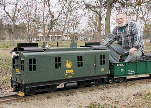 George Templin with the boxcab diesel he designed, and subsequently built by Roll Models.