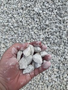 Crushed limestone, 3/4 to 5/8 inch, ready for application as ballast for 1.5 inch scale railroad.