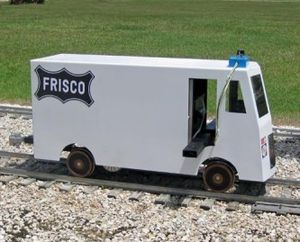 The High-Rail Truck decorated for Frisco. Notice the fold-out foot foot rests that hide behind working doors.
