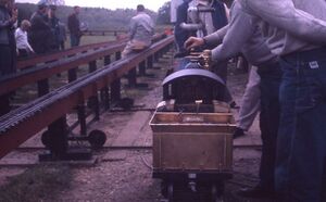 Unknown location, locomotive and engineers. From eBay, August 2020. Seller stated that photo was taken May 1961.