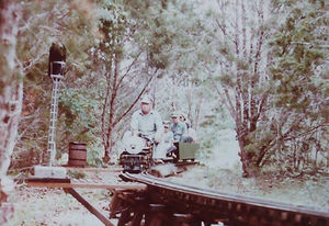Alex Hitzfelder headed over the curved trestle on Henry Blossom's railroad in Wimberly. Photo by Pete & Donna Green.
