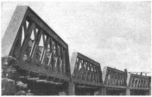The five span viaduct 86 feet long, wooden trusses on concrete piers and abutments, designed and built by Henry Greenly.