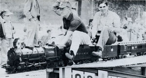 Joe Nelson on his 1 inch scale Pennsy Pacific at the Los Angeles Live Steamers Golden Spike meet, May 5, 1957.