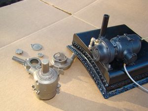 On the left is a set of castings from LS Steamers, and on the right is a Francis L. Moseley 1.5 inch scale steam turbine from about 1982. Posted on eBay, December 2014.