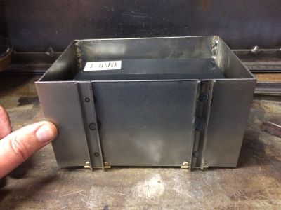 The battery box is large enough to hold a standard gel-cell battery. The battery will power the lights on the caboose.
