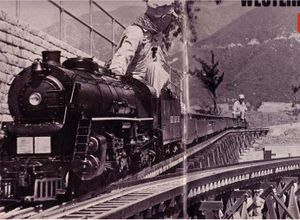 Seymour Johnson Backs his 7.5" gauge 4-8-4 up the ramp leading from the steaming tracks to the main lines. Retaining wall supports main station tracks. From Model Railroader, Sept 1969.
