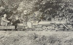 Horace Shaw at the throttle of 4-6-2 Pacific on his Whysall Light Railway, Summer 1938. Seated behind him is Hugh Pettis, son of Cliff Pettis of Houston, Texas. Photo by Cliff Pettis. From Live Steam Magazine, March 1979.
