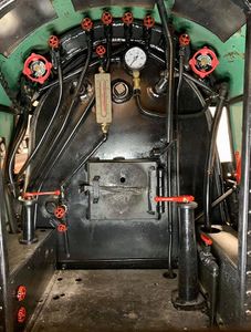 View of the cab of Santa Fe 5001 with freshly painted valves.