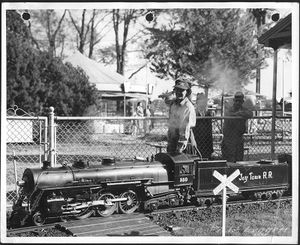 Engineer Vachon with Joy Town Railroad Hudson. Miss Vachon worked at the Friend's Yankee Shop, and also ran the locomotive at Friend's Joy Town Railroad at the Topsfield, Mass. fairgrounds in the 1950s. Photo by A.W. Leggett.