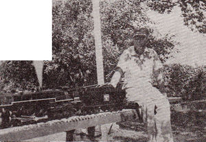 Lloyd Shuster of Waterloo, Iowa running R.C. Lippens engine at Waterloo.
