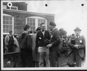 Charlie Purinton is the young man to the left of center (with the hooded jacket), at the age of 16. Laverne Langworthy is the gentleman in the far right of the image walking towards the camera. This was a meet held in 1938 at Danvers, MA.