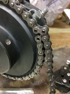 Place the chain on the two sprockets in order to measure the correct length. You will need to use either a Connecting Link or Offset Link, depending on which section of the chain must be removed. Use a black Sharpie marker to indicate which link pins to remove.