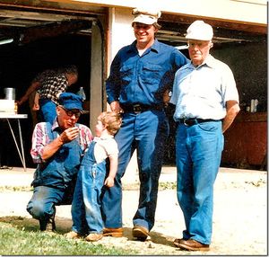 This shows four (4) generations of Purintons. Bob Hornsby took this at a live steam meet in Epping, New Hampshire. L-R: Charles S. with his grandson Zach (Cap’s son). Charles A. (Cap) and Charles (Carl) A. Purinton. June 16, 1984.