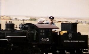 Ken Scheer on the throttle of K-27 #463 of the Comanche Crossing & Eastern Railway just outside Strasburg, Colorado, September 1992, on the first run over the newly completed 40 foot trestle.