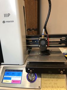 Printing a brake shoe in black PLA on low-cost 3D printer.