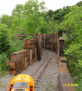 A tunnel constructed with 330 pound railroad ties.
