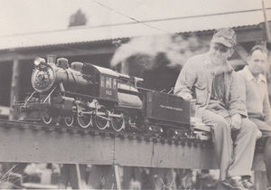 The late Ken Souser of the Pennsylvania Live Steamers is shown driving George Thomas's 1 inch scale RDG 4-6-0 camel-back at the 20th Anniversary BLS Meet on August 31, 1952. His passenger is unidentified New Haven engineer. From Live Steam Magazine, June 1972.