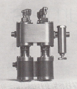 This little duplex pump is of LBSC design and was built by Frank Birch. It has 5/16 inch bore (steam) and 5/32 inch water pistons. Although made to pump water, this tiny rig withstood a test by steam as it pumped up a toy balloon with air.