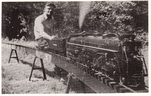 Fred Bohn of Bridgeport, Conn. and his Union Pacific 4-6-6-4 on the Main Line of Waushakum Live Steamers meet, 1956. From The North American Live Steamer, Volume 1, Number 6, 1956.