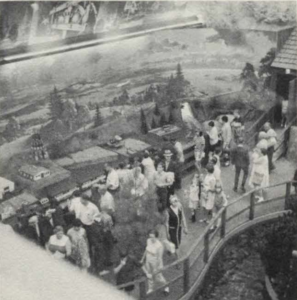 Inside the pavilion the train winds through scaled down Maine landscape. The entire train weighs more than half a ton.