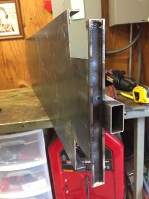 The floor plats have been welded to the side beams. The center beam and bolster supports have been attached as well. The end beam has been welded to the end of the floor and the coupler pocket. The half rounds were previously brazed on the end beam.