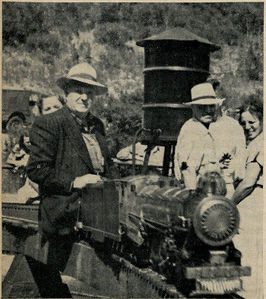 S.P. Engineer Gorham Koeppe bid in this run on Ray Weiber's powerful locomotive. The water tank in the background is used to fill engine tenders -- also engineers, sometimes.